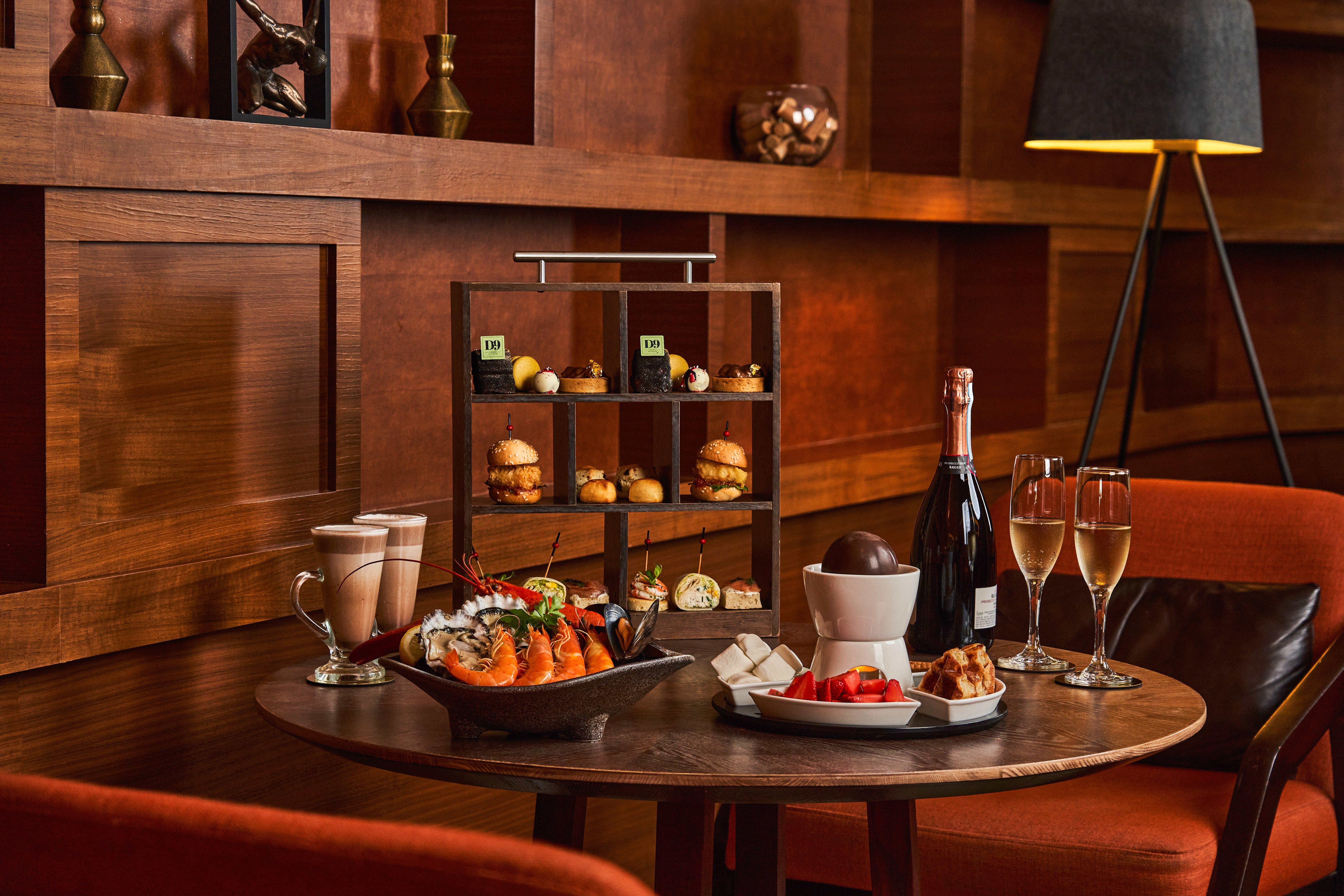 Voco Orchard Singapore By Ihg Extérieur photo Afternoon tea at the Savoy