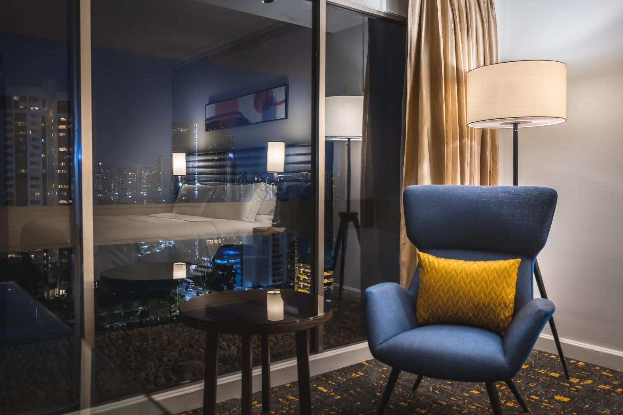 Voco Orchard Singapore By Ihg Extérieur photo A room at the hotel