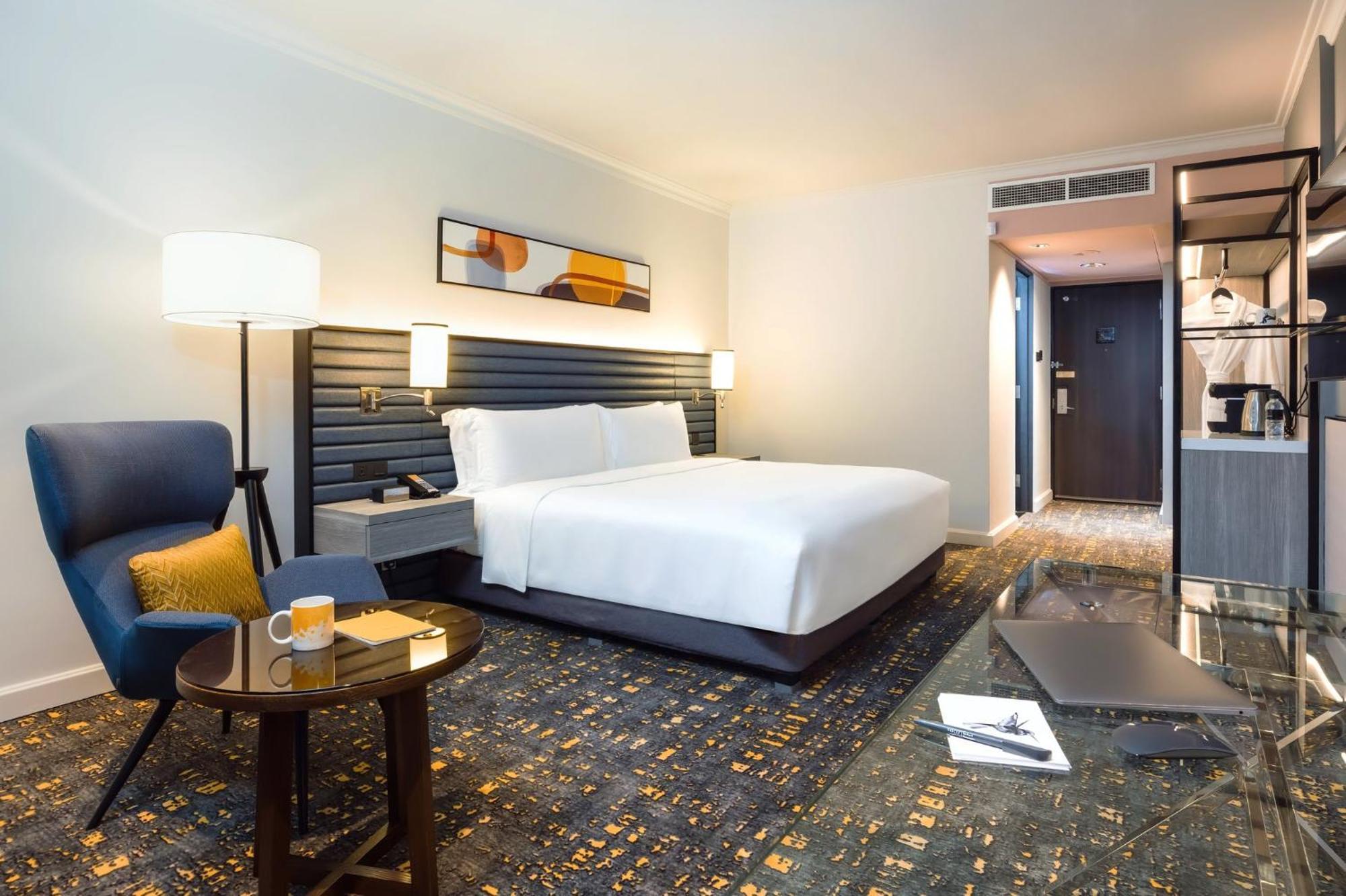 Voco Orchard Singapore By Ihg Extérieur photo A room at the hotel