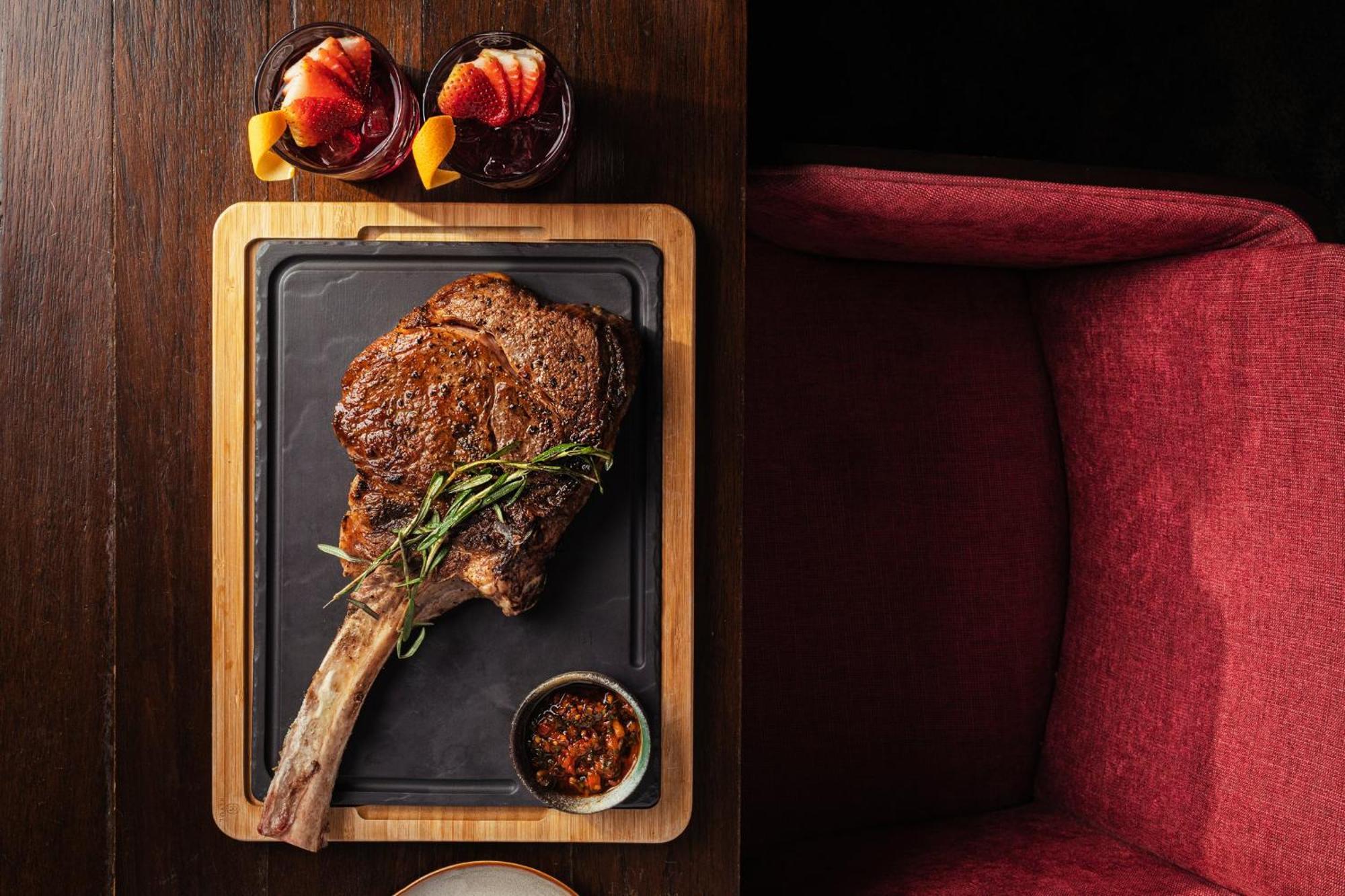 Voco Orchard Singapore By Ihg Extérieur photo A tomahawk steak