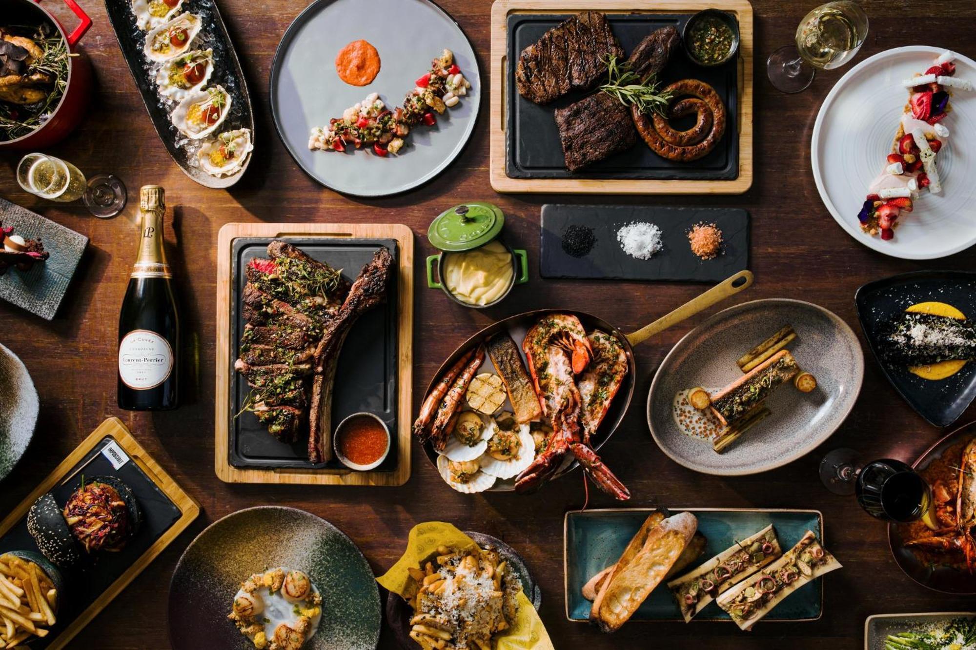 Voco Orchard Singapore By Ihg Extérieur photo A selection of dishes from the restaurant
