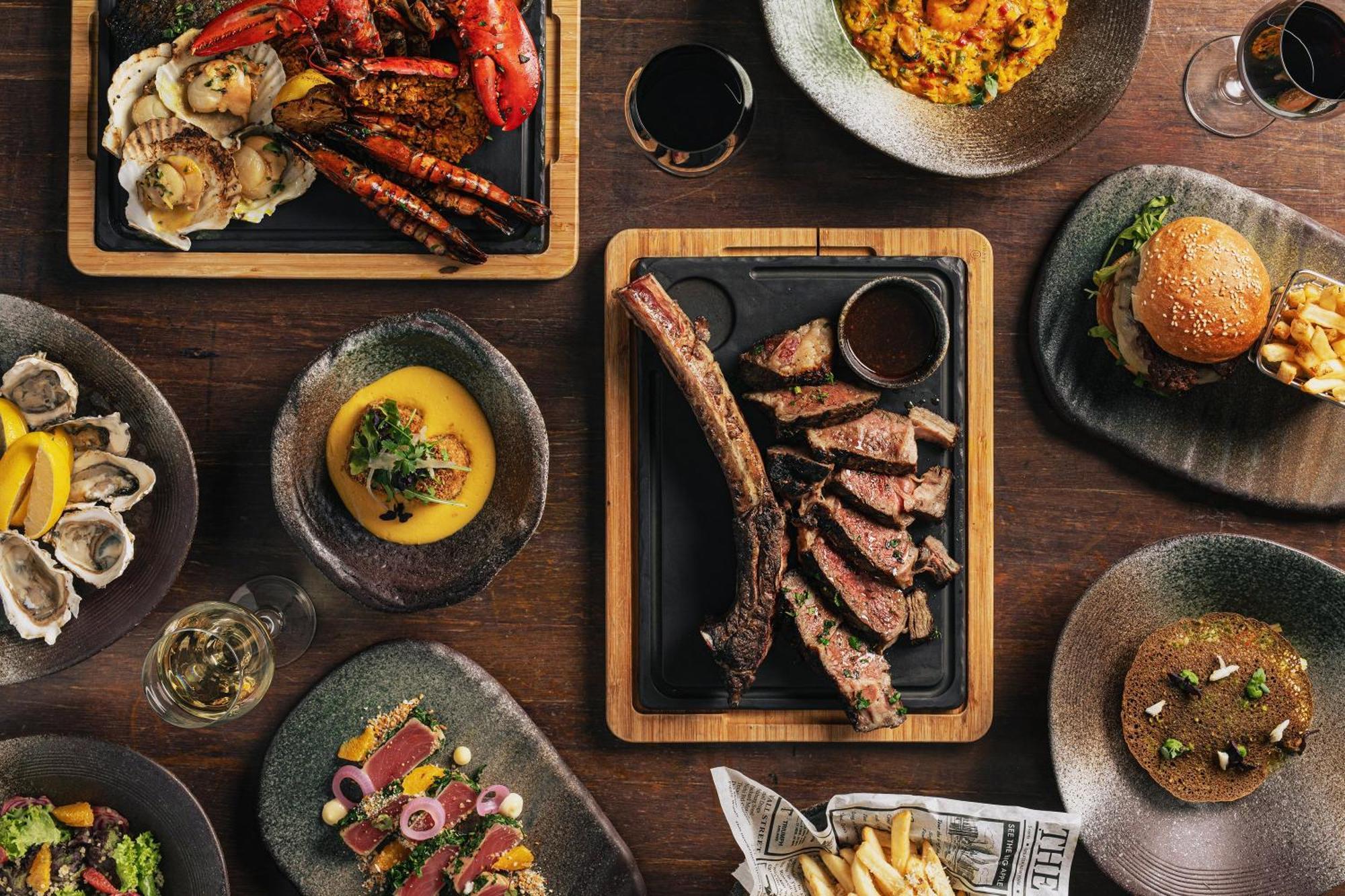 Voco Orchard Singapore By Ihg Extérieur photo A selection of dishes from the restaurant